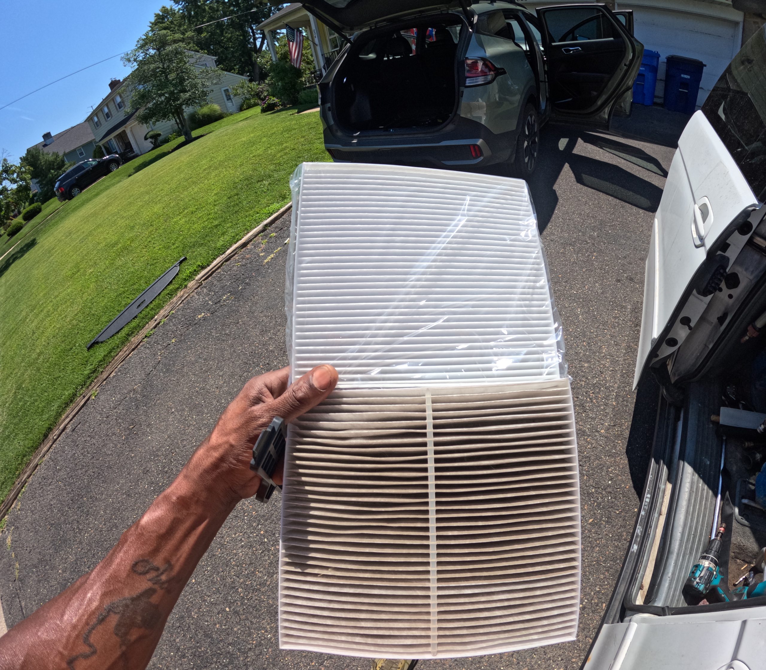 Dirty cabin air filter compared with a clean replacement cabin filter
