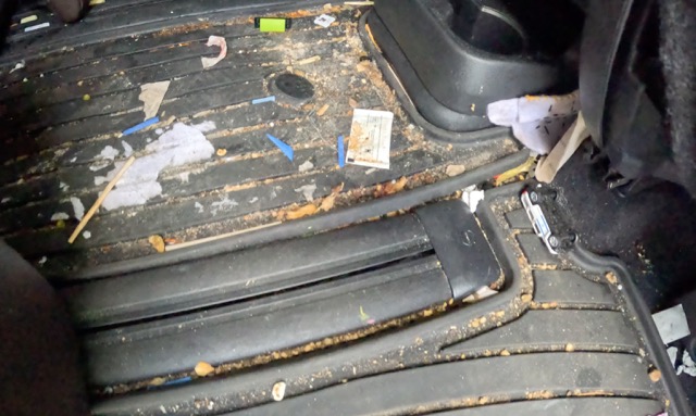 Dirty vehicle floor mats before steam cleaning in Marlton NJ