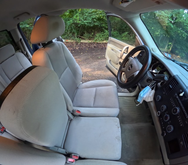 Dirty front cloth seat before steam cleaning and interior restoration in Medford NJ